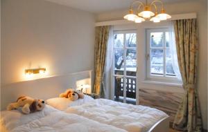 Uma cama ou camas num quarto em Landhaus Mit Sauna Kleblach
