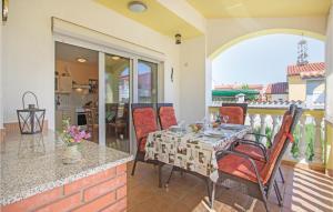 Balkón nebo terasa v ubytování Two-Bedroom Holiday Home In Betiga + 15 fotografií