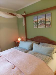 Postel nebo postele na pokoji v ubytování Ferienwohnung Ilona, Armin & Simon Funke