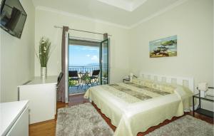 Posteľ alebo postele v izbe v ubytovaní Holiday Home Gornje Tucepi With Sea View 313