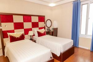 Voodi või voodid majutusasutuse Hanoi City Backpackers Hostel toas