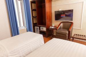 Voodi või voodid majutusasutuse Hanoi City Backpackers Hostel toas