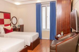 Voodi või voodid majutusasutuse Hanoi City Backpackers Hostel toas