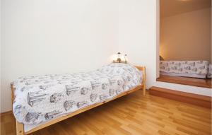Posteľ alebo postele v izbe v ubytovaní One-Bedroom Apartment In Sibenik