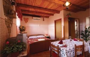 Postel nebo postele na pokoji v ubytování Holiday Home Frki V