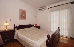 Postel nebo postele na pokoji v ubytování Apartment Korcula With Sea View Vi