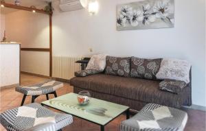 Posezení v ubytování Three-Bedroom Apartment In Jesenice