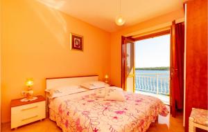 Postel nebo postele na pokoji v ubytování Holiday Home Prizba Bb