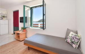 Postel nebo postele na pokoji v ubytování Two-Bedroom Holiday Home In Zastrazisce
