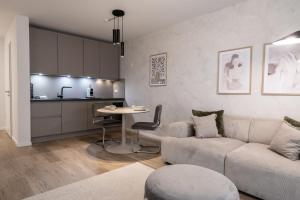 Kuchyň nebo kuchyňský kout v ubytování Apartments Lenuel
