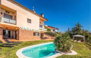 The swimming pool at or close to Lovely Home In Sant Cebrià De Vallalta