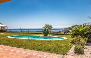The swimming pool at or close to Lovely Home In Sant Cebrià De Vallalta