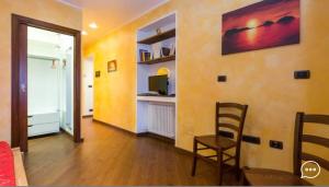 TV a/nebo společenská místnost v ubytování Wallace Apartment