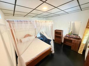 Postel nebo postele na pokoji v ubytování Sasaa Guest House