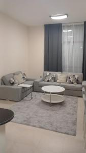 Posezení v ubytování P one Hotel apartment