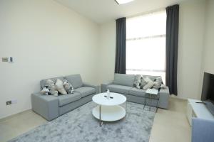 Posezení v ubytování P one Hotel apartment + 12 fotografií
