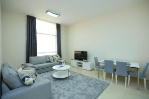 Posezení v ubytování P one Hotel apartment