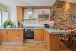 A kitchen or kitchenette at Casa Playa de Balares