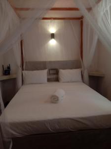 Postel nebo postele na pokoji v ubytování Chameera guest house