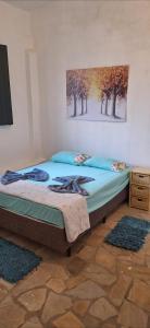 Postel nebo postele na pokoji v ubytování Paradise Hospedaria São Thomé