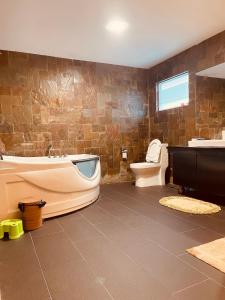 Koupelna v ubytování Pelita Commercial Centre Homestay 百丽达商圈民宿 9pax
