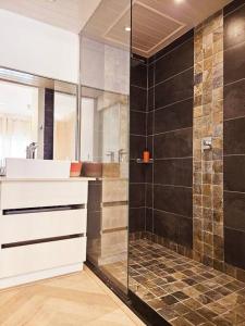 a bathroom with a sink and a shower at Seaside 3 suites Penthouse with Pool Gym & BBQ Terrace in Cap Malheureux +96 photos