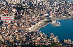 an aerial view of a city with a lake at Chic Apartment in Center in Split