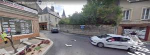 a car parked on a street in a city at Chambres Zohra Centre ville in Decize