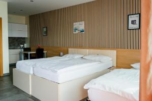 Voodi või voodid majutusasutuse Nava Motel SELF CHECK-IN toas
