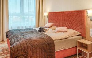 Ένα ή περισσότερα κρεβάτια σε δωμάτιο στο Awesome Apartment In Miedzyzdroje