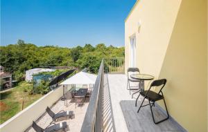 Balkón alebo terasa v ubytovaní Cozy Home In Porec With Kitchen + 28 fotografií