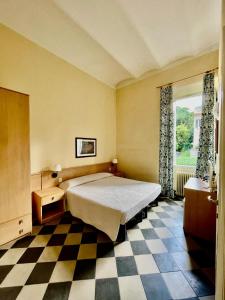 Postel nebo postele na pokoji v ubytování Hotel Florenz