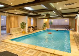 Piscina en o cerca de Al Liwan Residence