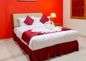 Cama o camas de una habitación en Al Liwan Residence