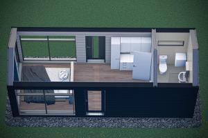 a floor plan of a house with a room at Northern Lights Haven in Ytre Tomasjord