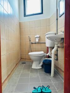 Koupelna v ubytování AmanCin by Aman homestay