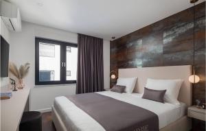 Posteľ alebo postele v izbe v ubytovaní Pet Friendly Apartment In Zidarici
