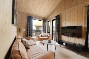TV a/nebo společenská místnost v ubytování Mosetertoppen Skistadion - Hafjell Ski Resort