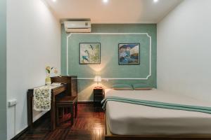 Postel nebo postele na pokoji v ubytování Legume House - 50m to Hoan Kiem lake