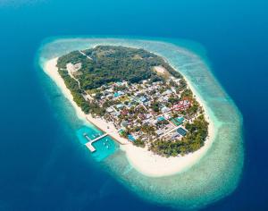 an island with a resort in the middle of the ocean at PRIV Fodhdhoo in Fodhdhoo