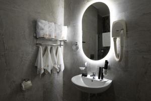 Kopalnica v nastanitvi Hotel Mio City