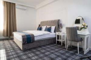 Postelja oz. postelje v sobi nastanitve Hotel Mio City