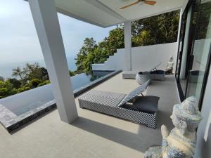 Haad TianVilla Vista, piscine privée à débordement vue mer !的海景庭院