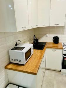 Η κουζίνα ή μικρή κουζίνα στο Apartament Spring