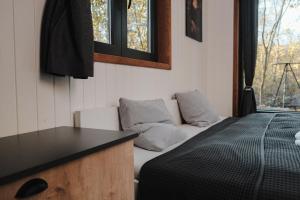 Postel nebo postele na pokoji v ubytování Dragon Glamping