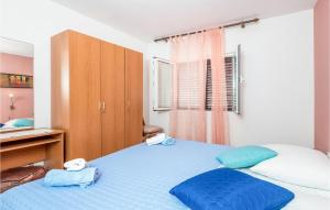 Postel nebo postele na pokoji v ubytování Nice Apartment In Mali Losinj With Wifi