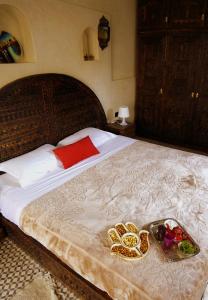Postel nebo postele na pokoji v ubytování Auberge RIAD DLIM Tamraght