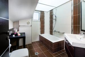 Kúpeľňa v ubytovaní Kronos Villas