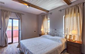 Postel nebo postele na pokoji v ubytování Villa Rea