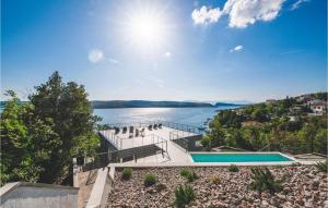 a house with a view of the water at Villa Grace in Jadranovo